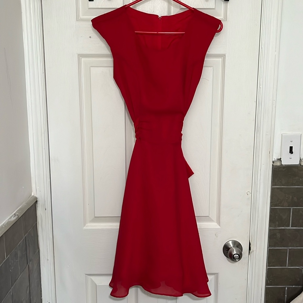 Women’s red size small formal dress sleeveless with bow in the back